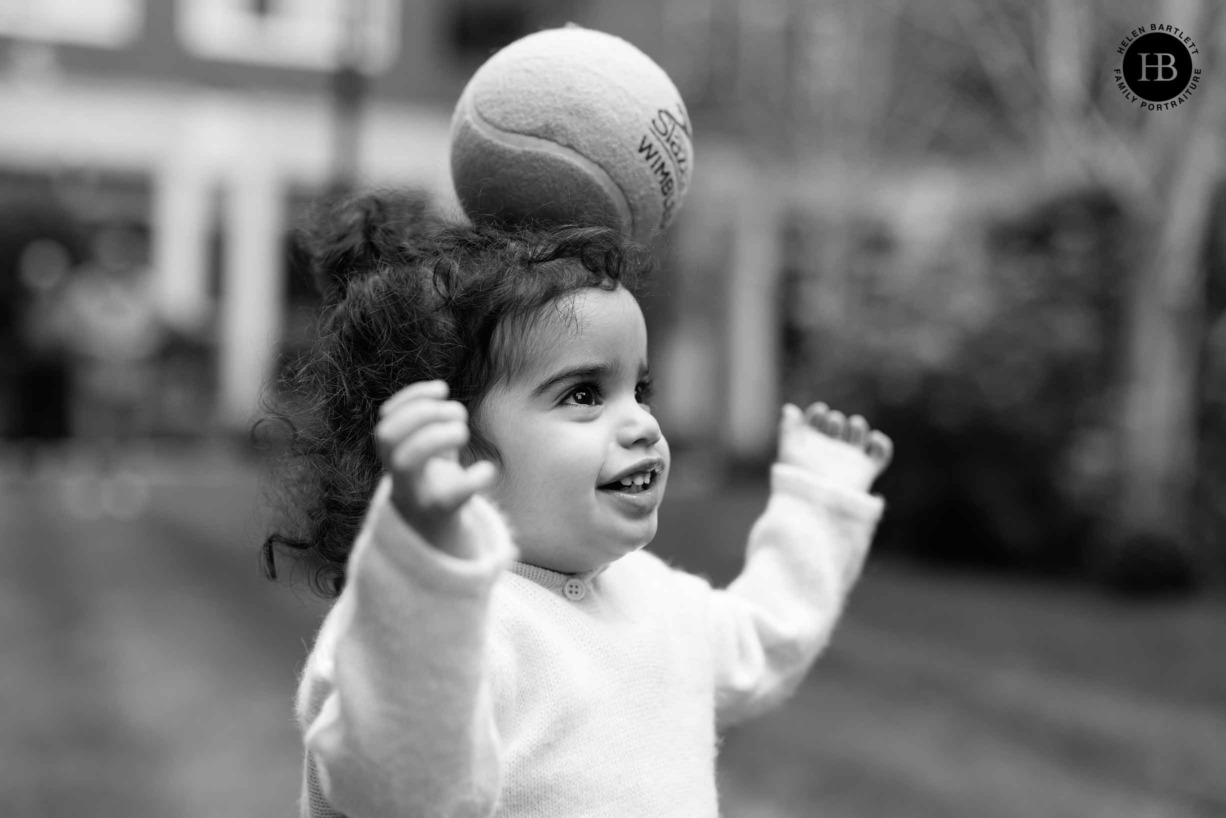 little-boy-balances-ball-on-head