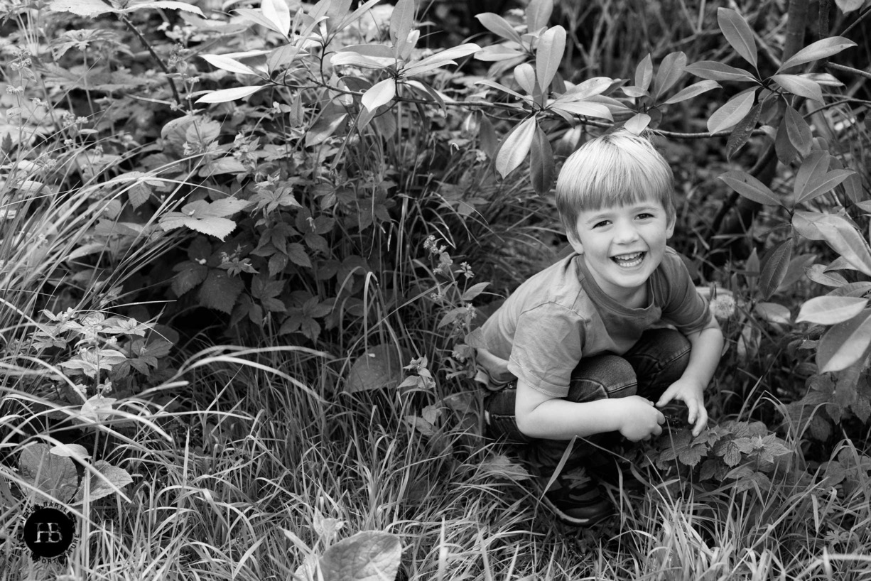 little-boy-plays-hide-and-seek