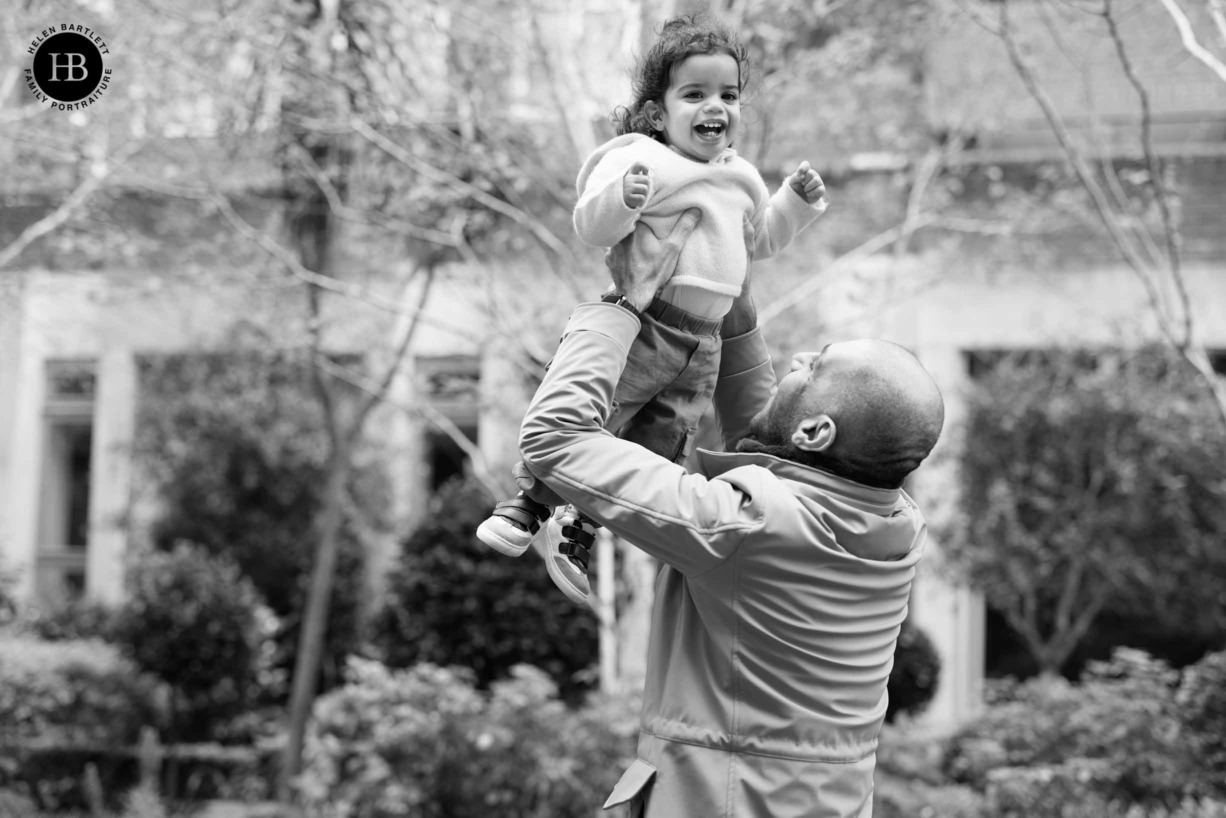 little-boy-thrown-air-father-fun-family-photography